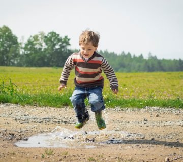 Boy jumping near grass at daytime 1104014 1 360x320